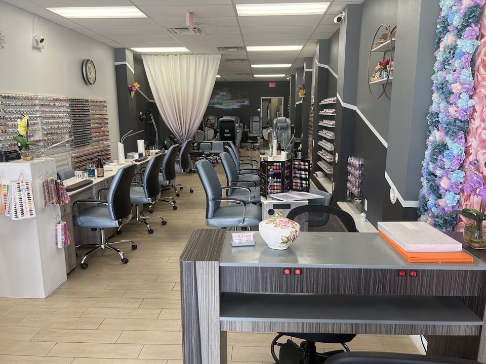 Nail art display in a bright salon setting.